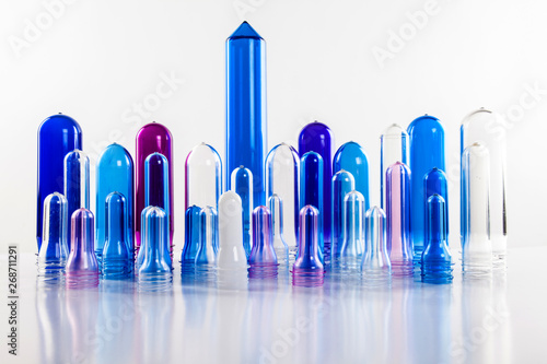 The various type of plastic bottle product and preform material with white background