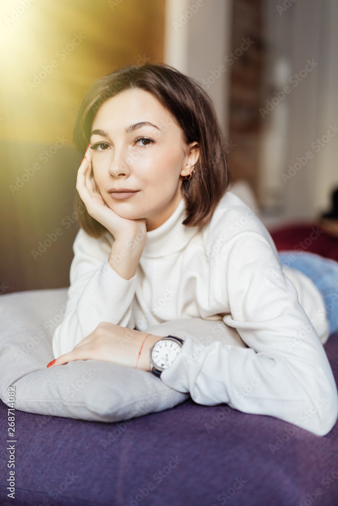beautiful young woman lying relaxing on the couch, sofa home indoors beautiful young woman lying relaxing on the couch, sofa home indoors