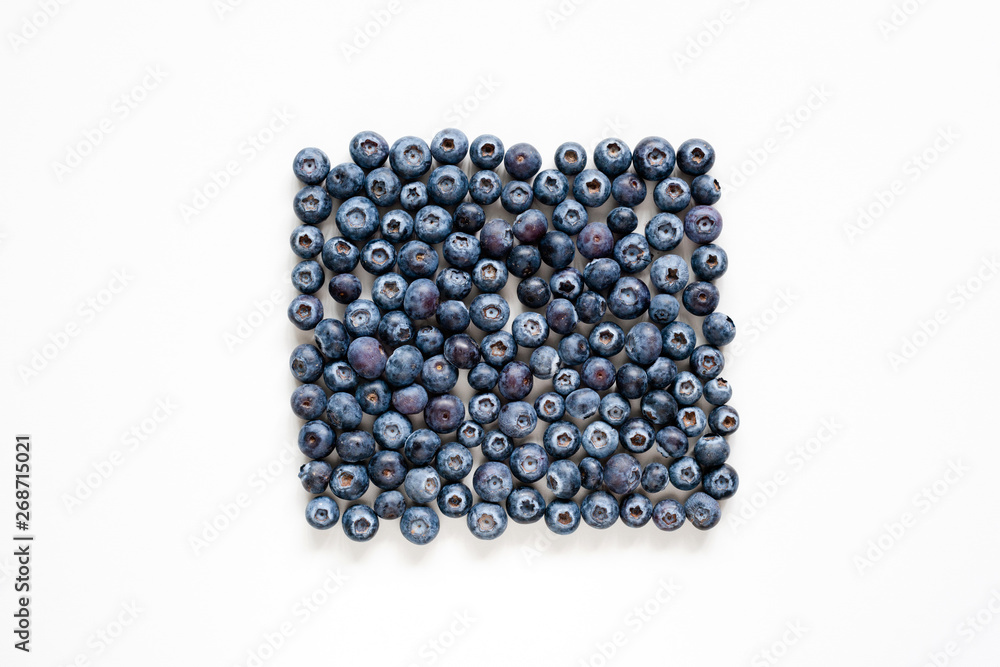 Naklejka premium Blueberries on white background. Flat lay berries. Top view