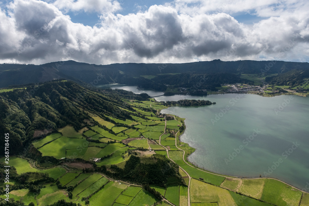 aerial landscape of the impressive volcanic crater with Lagoa Azul at Sete Cidades