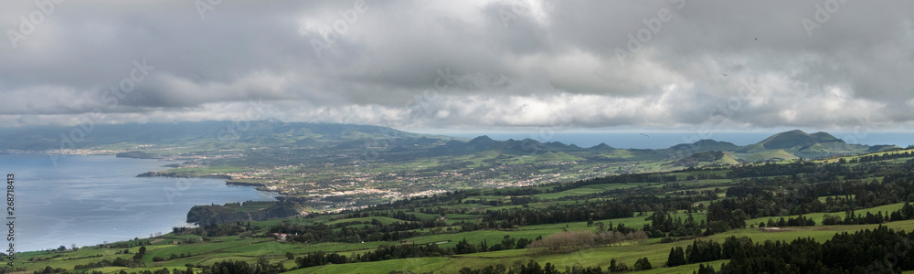 aerial image of the island of Sao Miguel as seen from the volcano of Sete Cidades in direction to the east