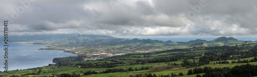 aerial image of the island of Sao Miguel as seen from the volcano of Sete Cidades in direction to the east