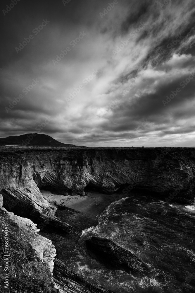 clouds over mountains amd ocean in montana de oro california