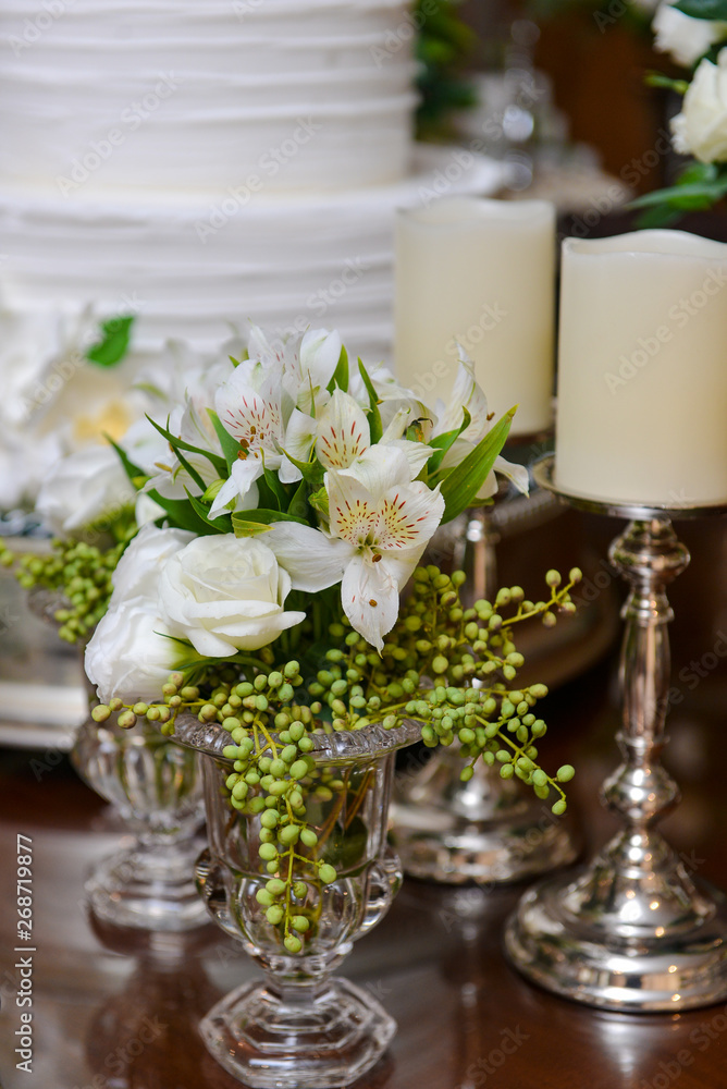 wedding table with flowers and candles, natural flowers