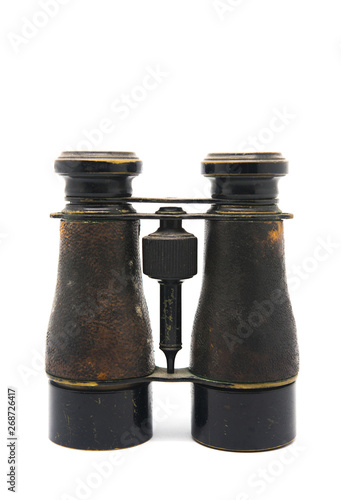 black antique binoculars on white background