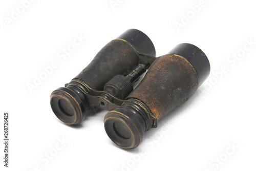 black antique binoculars on white background