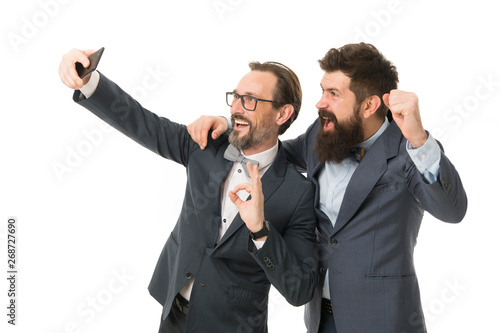 selfie of success. business communication on meeting. team success. partnership of men speaking on phone. collaboration and teamwork. mature men. Agile business. bearded businessmen in formal suit