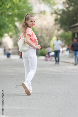 Looking her very best in this stylish and comfortable wear. Adorable stylish girl. Small fashion model with stylish look. Little cute child with long blond hair in stylish fashion wear