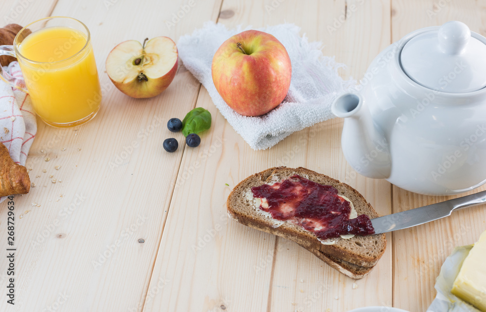 Breakfast on a wooden simple table.. Croissants Breakfast with aromatic tast. Good morning, great start to the day. Breakfast on a wooden simple table.. Croissants Breakfast with aromatic tast. Good morning, great start to the day.