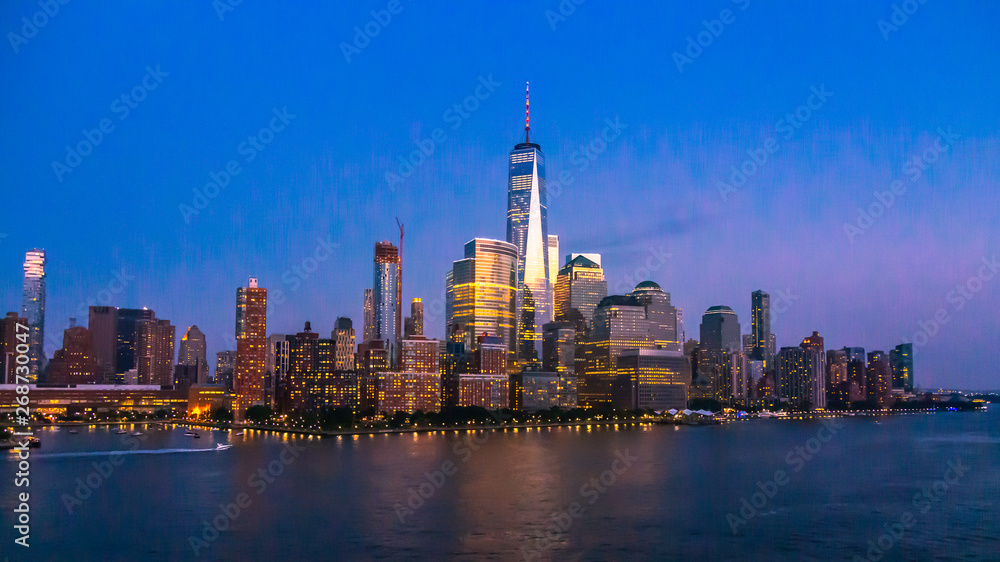 New York City Skyline with Skyscrapers Illuminated at Dusk