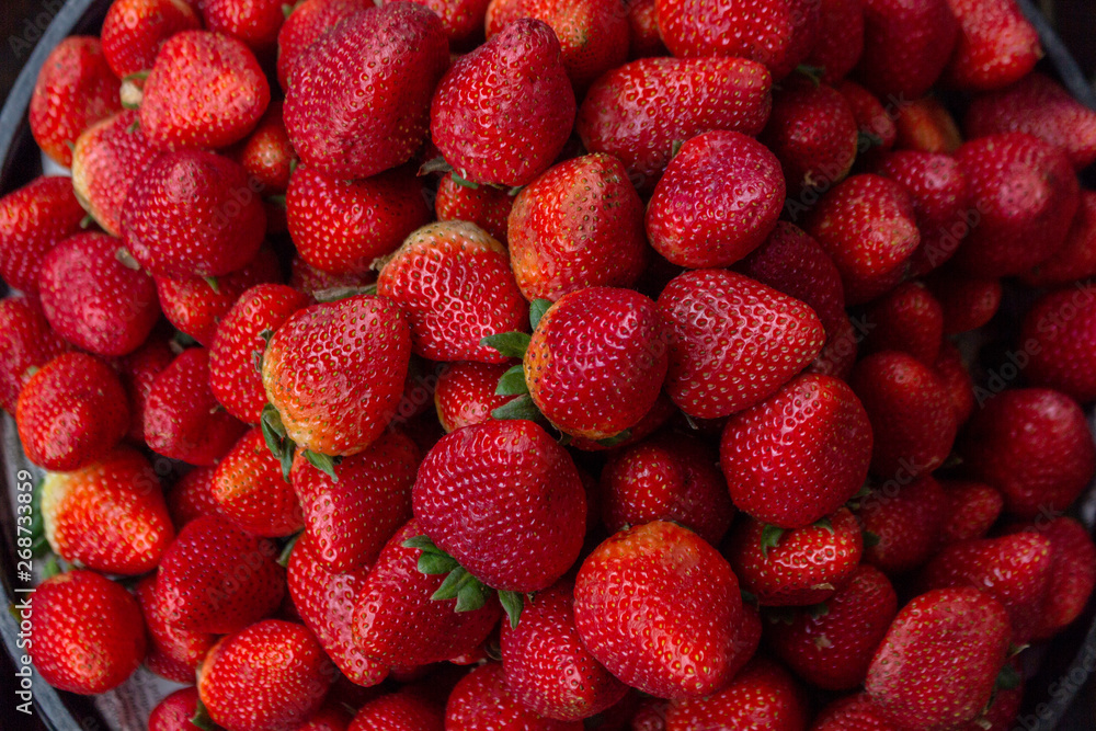 Aerial shot of juicy strawberries for sale Aerial shot of juicy strawberries for sale
