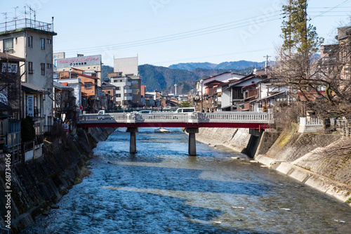 Japan-March 17, 2018, Scenery of Miyagawa river which pass through Takayama city, Takayama is famous for its well-preserved Edo style street and houses, Hida Takayama, Gifu, Japan. © Wuttisit