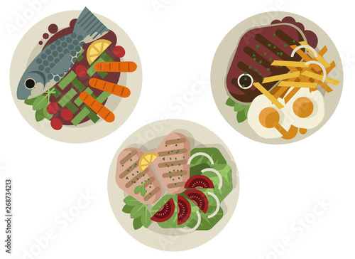 fish, beef and grilled chicken plates with salad vegetables and eggs and french fries restaurant gourmet food