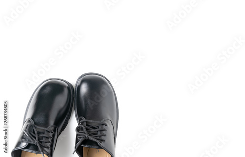 New leather student shoes isolated on white