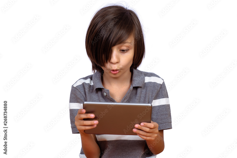 Little boy using digital tablet. Little boy using digital tablet.