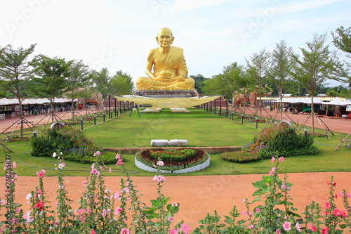  Nakhon Ratchasima Province, THAILAND - MAY 6, 2019: Big golden Luang Pu Thuat Statue at Khaoyai ,Nakhon Ratchasima, Thailand. photo