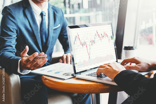 Business Team Investment Entrepreneur Trading discussing and analysis graph stock market trading,stock chart concept photo