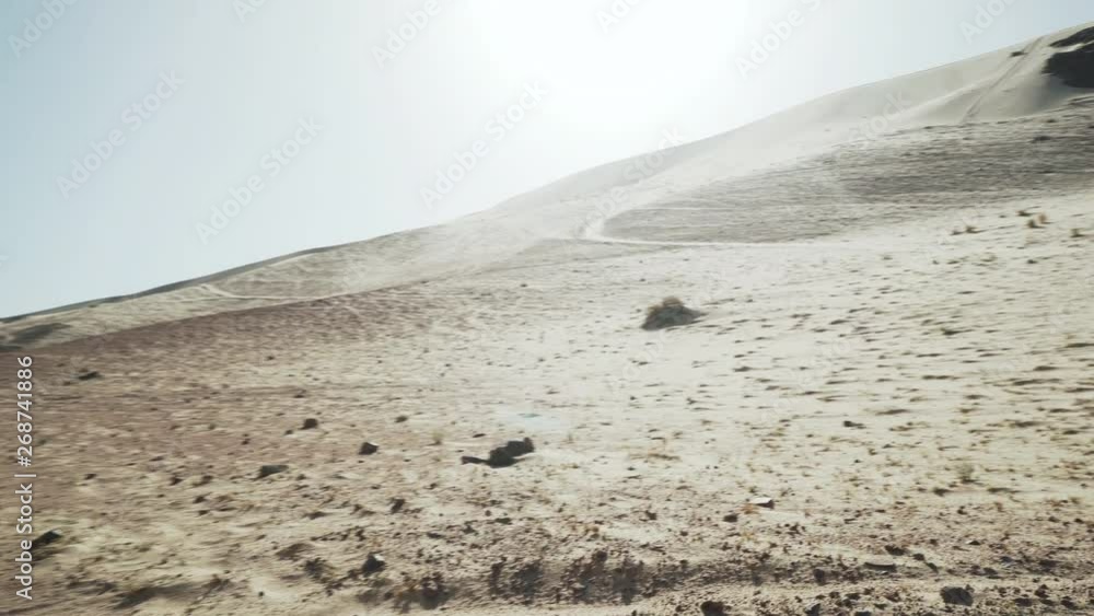 Empty sand and rock hot desert landscape panorama 4k