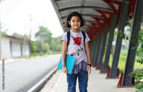Back to school.Education.Two elementary school student with book and satchel student.Beginning of school lessons.Cute kid smiling is going to school © pic for you