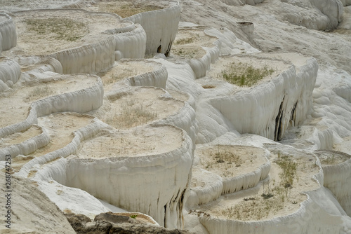 Pamukkale - a Turkish town located in the Cürüksu Valley, about 18 km from Denizli. It is famous for limestone deposits formed on the slope of the Cökelez mountain.