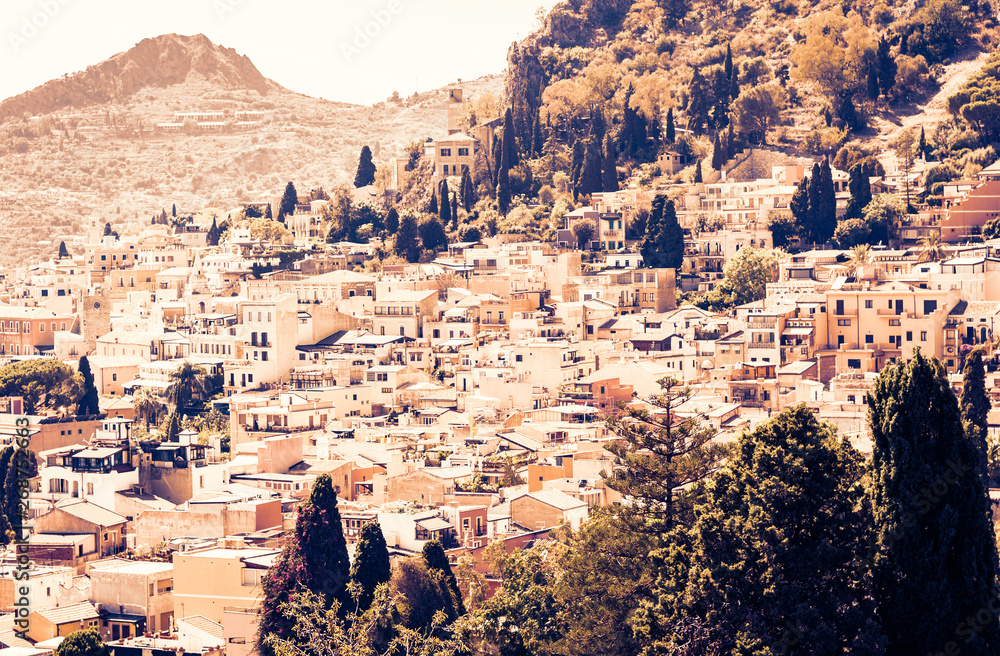 Obraz premium Sicily sunset, beautiful cityscape, rooftops of Taormina.