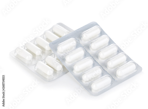 Valokuva Capsule pills in blister pack close-up isolated on a white background