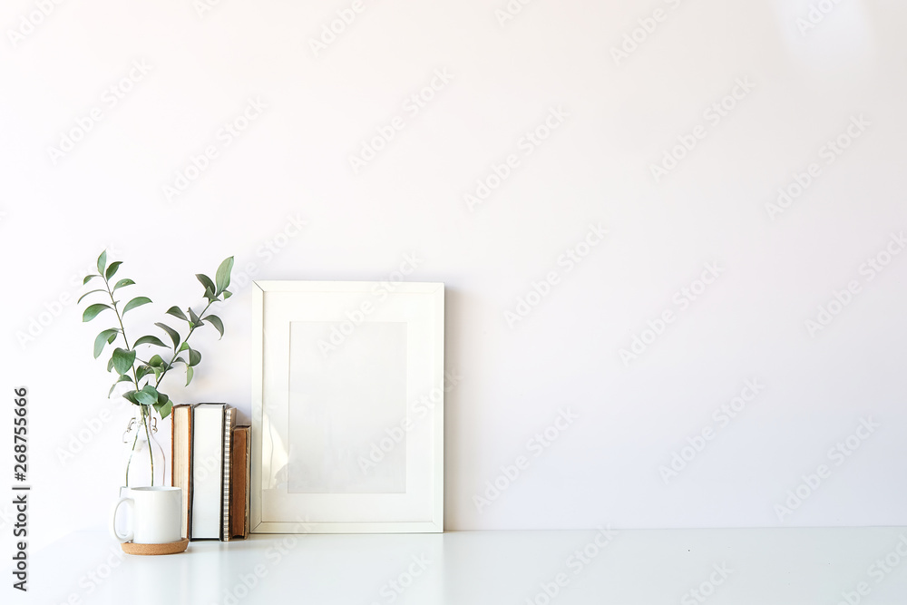 Mockup workspace desk and copy space books,plant and coffee on white desk. Mockup workspace desk and copy space books,plant and coffee on white desk.