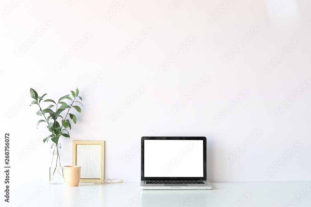 Fototapeta premium Workspace desk and laptop. copy space and blank screen. Business image, Blank screen laptop and supplies.