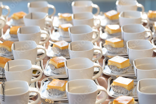 Many coffee cups, customer service during the conference break