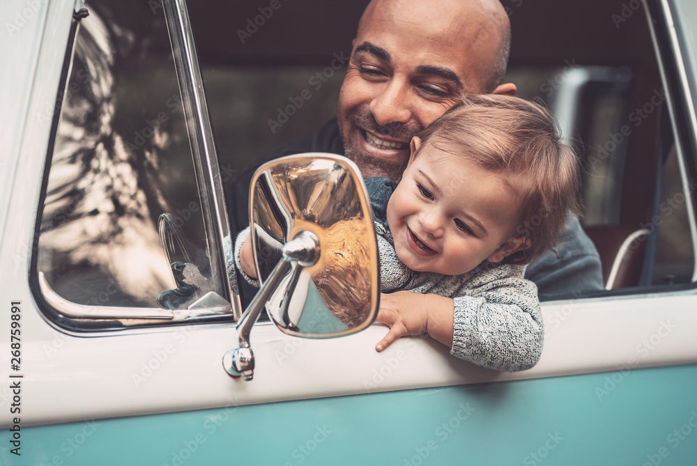 Happy father with son driving a car Stock Photo | Adobe Stock
