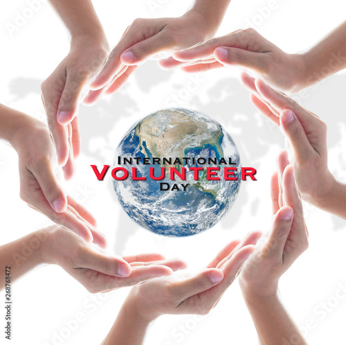 International volunteer day for social and economic development concept. Elements of this image furnished by NASA photo