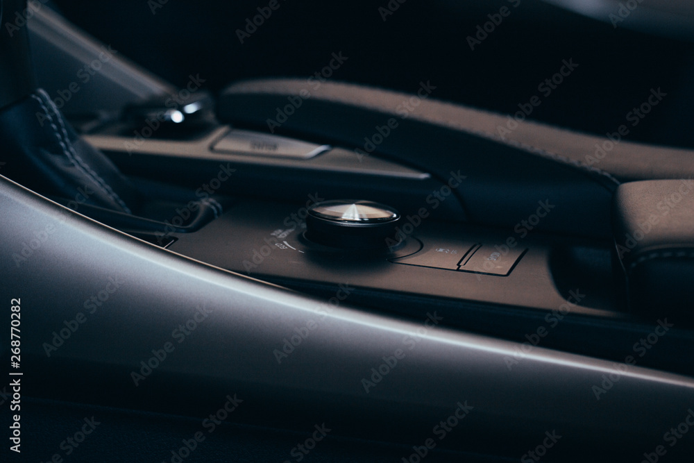 interior modern car elements, close-up of handbrake and seat belt