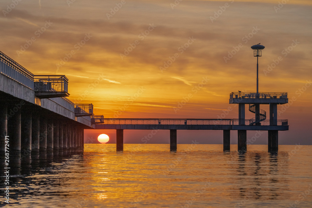 Red sunrise in Burgas on the bridge. Scenic sunrise. 