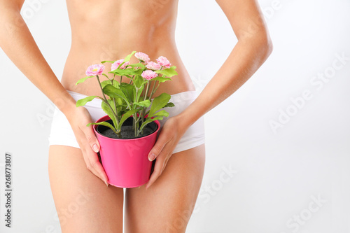 Beautiful young woman with ...