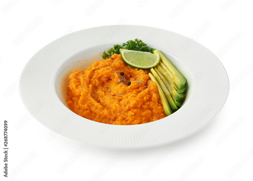 Plate with mashed sweet potato and avocado on white background Plate with mashed sweet potato and avocado on white background