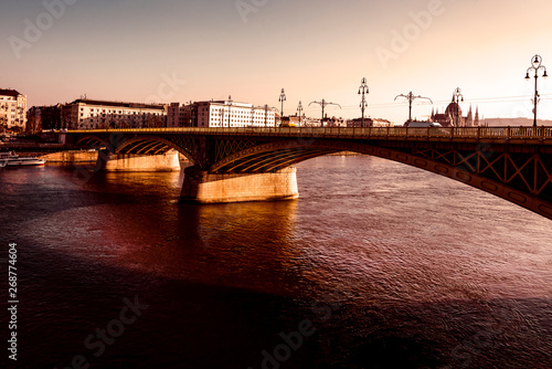 Hungary  Budapest  Skyline panorama with famous Margaret Bridge or Margit hid over Danube Donau river against dramatic afternoon sunlight in the city center of the Hungarian capital - concept travel