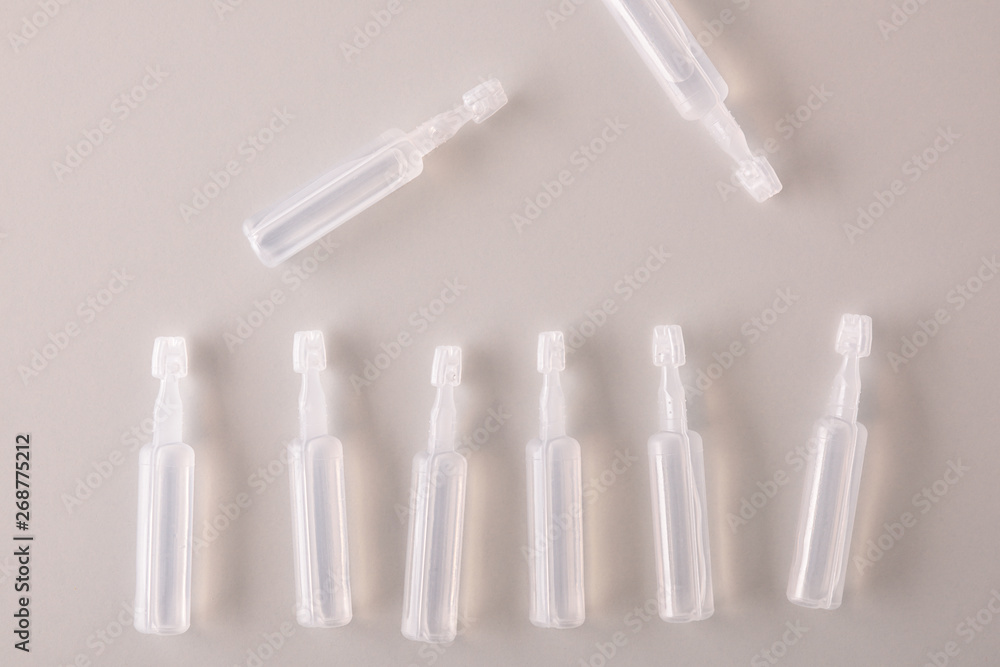 Pipettes eye drops on white table top Pipettes eye drops on white table top