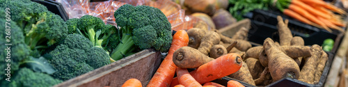 Fresh vegatables on market stall - panoramic background
