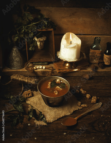 Fototapeta Naklejka Na Ścianę i Meble -  candles eatig soup