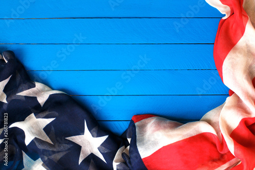 American flag on blue wooden background.The Flag Of The United States Of America. The place to advertise, template.