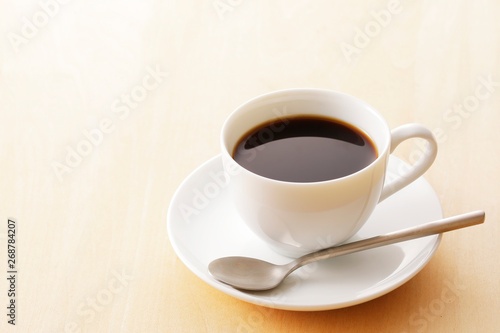                Coffee cup on wooden background