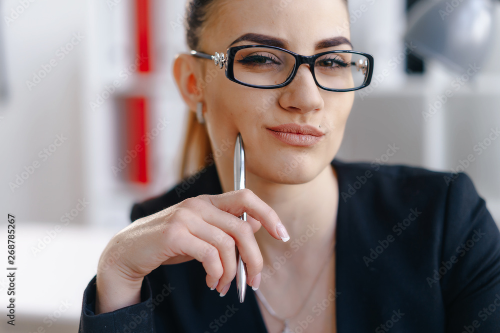 Pretty business woman in stylish glasses Pretty business woman in stylish glasses