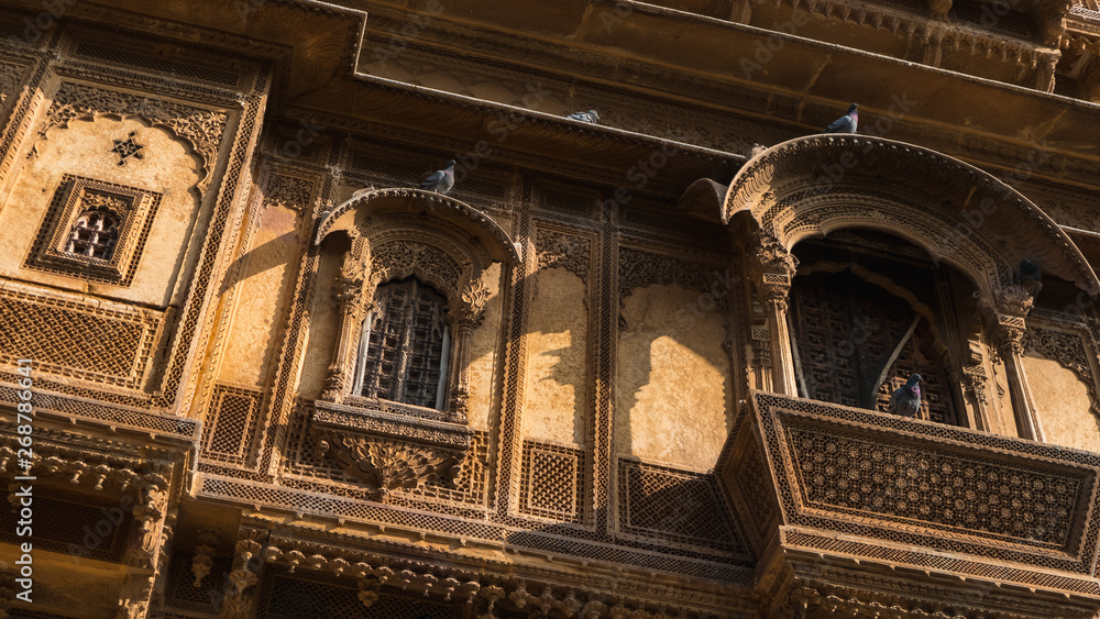 Buildings of intricate carvings in desert town Jaisalmer