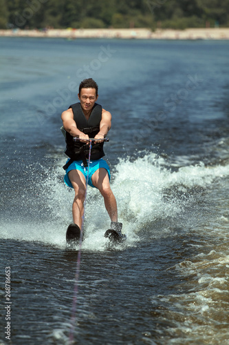Man riding water skis