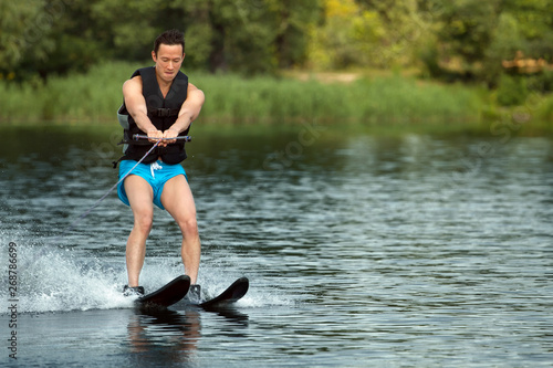 Man riding water skis