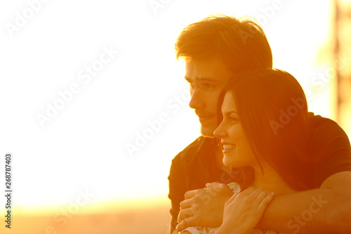 Couple in love contemplating views at sunset
