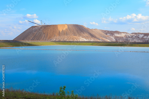 Soligorsk mountains. potash plant. Potash mountains near Soligorsk City. salt lake