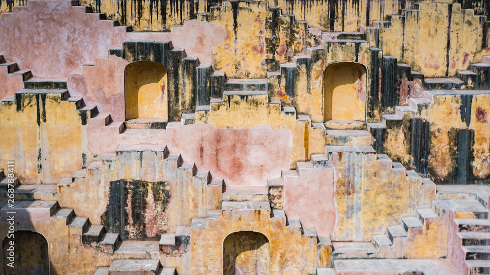 Fototapeta premium Staircases of a stepwell in Jaipur, India