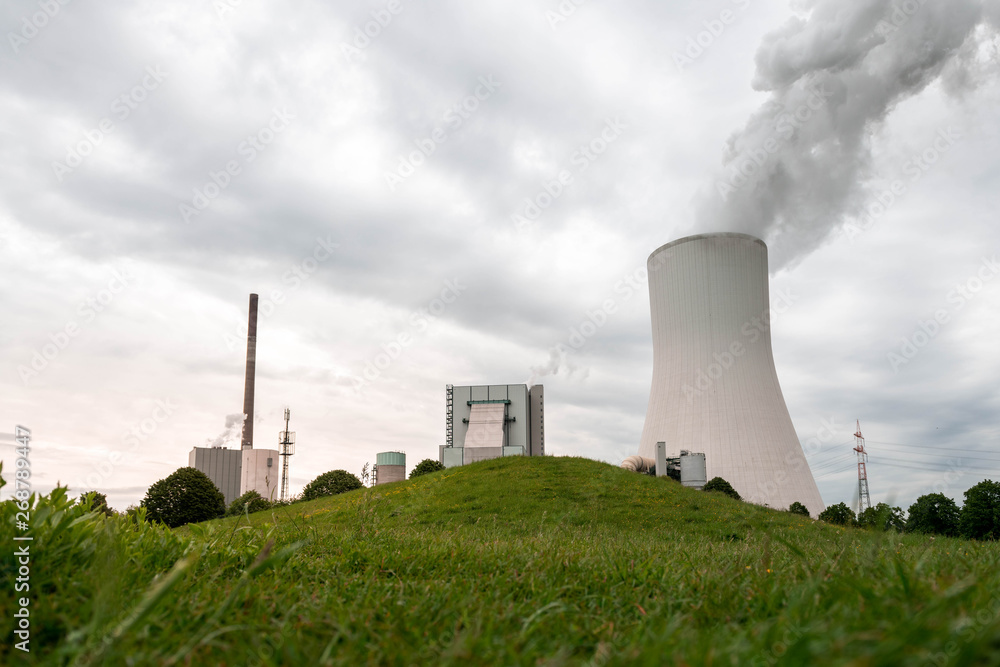 NRW/GERMANY - MAY 16, 2019: The company STEAG operates a two-unit combined heat and power plant in Duisburg, Germany. NRW/GERMANY - MAY 16, 2019: The company STEAG operates a two-unit combined heat and power plant in Duisburg, Germany.