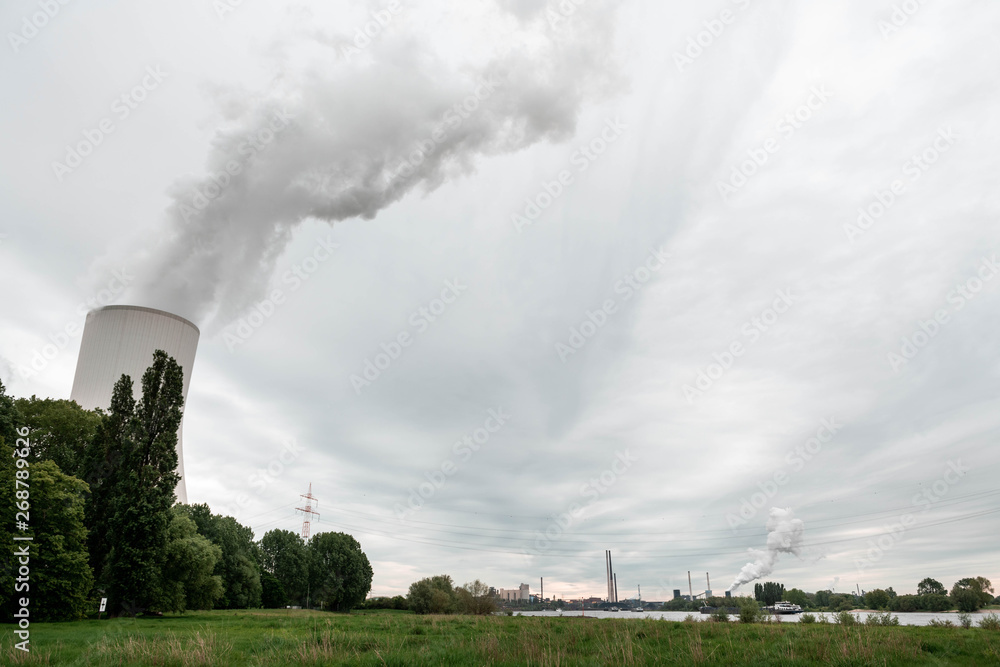 NRW/GERMANY - MAY 16, 2019: The company STEAG operates a two-unit combined heat and power plant in Duisburg, Germany. NRW/GERMANY - MAY 16, 2019: The company STEAG operates a two-unit combined heat and power plant in Duisburg, Germany.